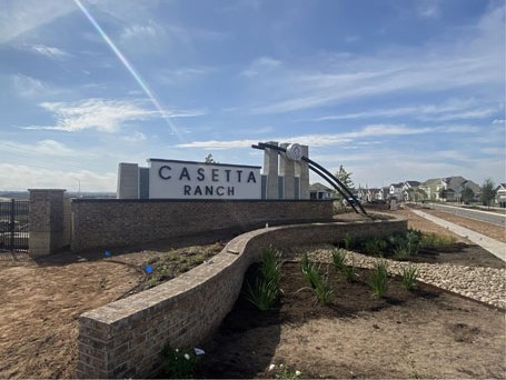 Community entry with landscape plantings