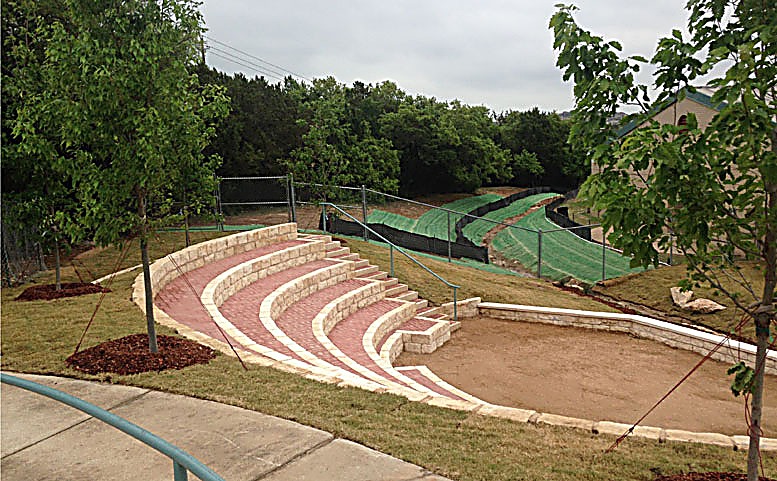 Completed amphitheater with stone seating