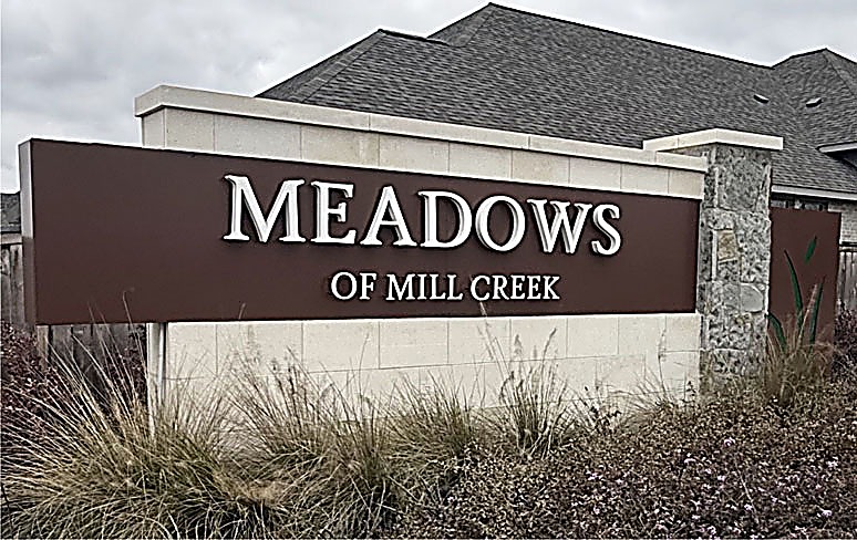 The Meadows of Mill Creek — renovated entry monument